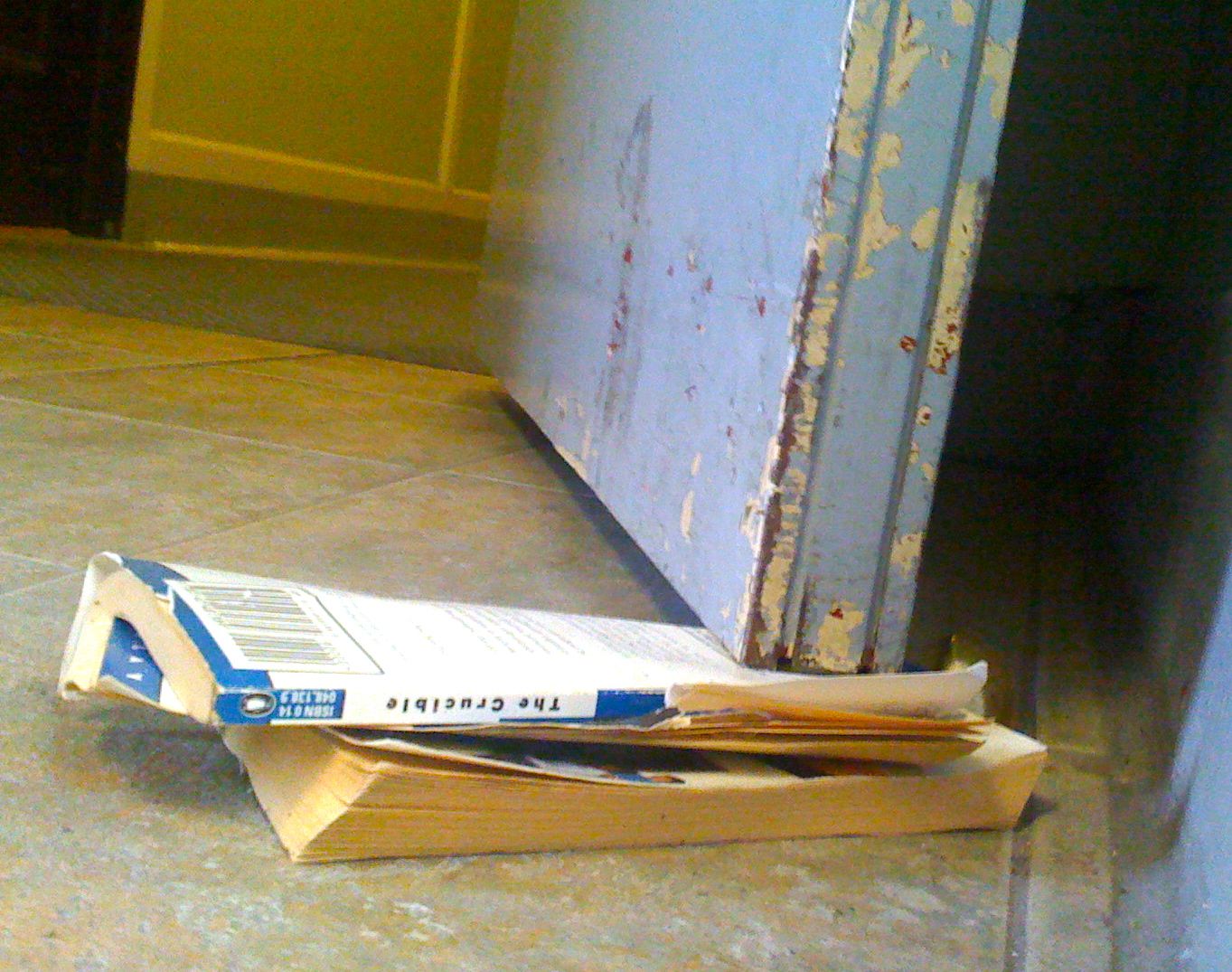 crucible_doorstop Arthur Miller's The Crucible used as a doorstop. Chicago, IL